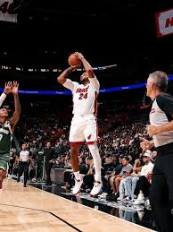 Erik Spoelstra leading the Miami Heat on the court