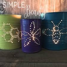 Diy Punched Tin Can Lanterns Stimuli Magazine Tin Can Lanterns Punched Tin Lantern Designs