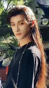 The Chinese Boy Who Has The Long Hair and He Done Upside Down Time Upside  Down Town Trip Out