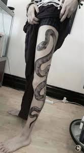 Get the snake wrapped around a wood stick, and add two beautiful birds on the side. Pin On Tattoos