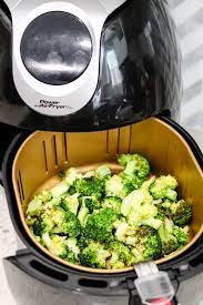 Evenly place the broccoli on the air fryer basket. Air Fryer Roasted Broccoli Low Calorie Low Carb Domestic Superhero