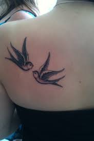 Swallow Bird Tattoo On Hand Meaning Love Traditional Swallow Tattoos When I Have Kids I Am Going To Get A Bird For Each Child In Different Colours Bird Shoulder Tattoos Foot Tattoos Tattoos