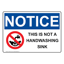 a handwashing sink sign with symbol