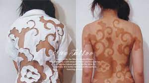 Be sure your artist covers your new tattoo in a thin layer of petroleum jelly and a bandage. Weird New Trend Sun Tattoos Glamour