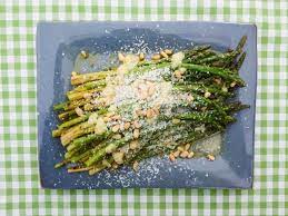 Five Ingredient Grilled Asparagus With Pecorino And Pine Nuts Recipe Grilled Asparagus Pine Nut Recipes Food Network Recipes