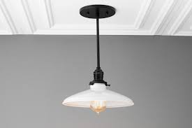 The amber glass shade adds interest. Pendant Model No 5389 Peared Creation