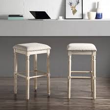Making it easy to rotate in any direction, the swivel bar stool allows you to be a part of the action anywhere. Arnhem Wood Upholstered Bar Stools Set Of 2 Overstock 30062278