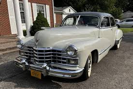 Image result for Lotus Cream 1947 Cadillac