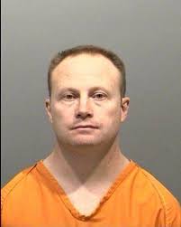 3 charged in business information-theft case