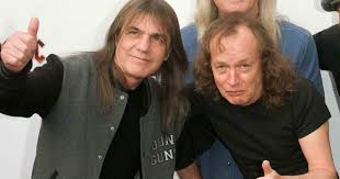The first time Malcolm Young and Angus Young were together in a band