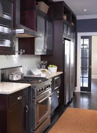 Espresso Stained Kitchen Cabinets With White Granite And Dark Floors Kitchen Decorating Ideas Dark Kitchen Cabinets Home Decor Kitchen Og Kitchen Remodel