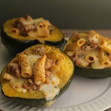 Baked Acorn Squash Filled With Italian Sausage And Rigatoni Pasta Recipe In 2020 Butternut Squash Ravioli Acorn Squash Italian Sausage