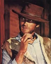 Clint eastwood, us actor, in costume, smoking a cigar and aiming a pistol in a publicity still issued for the film, 'hang 'em high', 1968. Do You Know Clint Eastwood Clint Eastwood Cowboy Clint Eastwood Western Movies