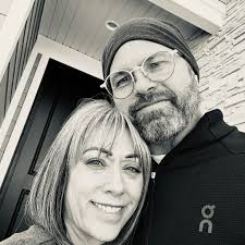 What home charger is recommended for an electric vehicle?