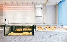 Kca Composes Yakafu Diy Bakery In China With Geometric Terrazzo Blocks Graphic Elements Bakery Design Coffee Shop Design Terrazzo