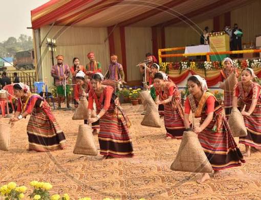 Image of Artists perform a traditional dance during the Bodoland Territorial Council oath-taking ceremony at Greenfield, in Kokrajhar District of Assam on December 15, 2020-EE686931-Picxy