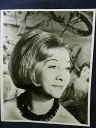 Vintage Mildred Albert black jeweled necklace poses for Glossy Press Photo