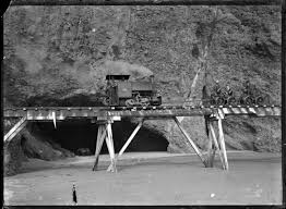 File:Steam railway locomotive the 'Sandfly' on the Karekare beach  tramway.jpg - Wikimedia Commons