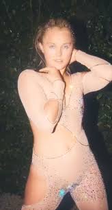 JoJo Siwa channels Toxic-era Britney Spears in sheer catsuit for new  Karma music video