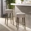 The armen living madrid armless bar stool features a unique aesthetic that is featuring a solid wood back, tufted faux leather seat and a stainless steel base, the mason swivel counter stool will pair nicely with a variety of decor styles. 1