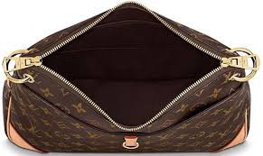 The top zipper opens to a cocoa brown fabric interior with patch pockets. Louis Vuitton Odeon Bag Bragmybag