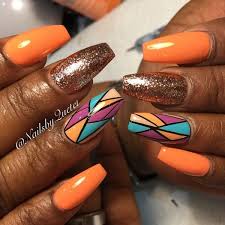 Looking for some inspiration for your manicure? 36 Outstanding Orange Nail Designs