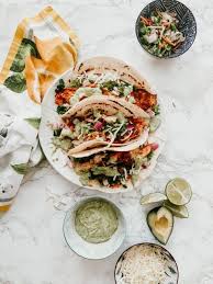 Start with a tortilla, a spoonful of badfish baja sauce, a strip of blackened grouper, some finely chopped red onion, spoonful of pico de gallo, and sliced avocado on top. Blackened Fish Tacos A Table Top Affair Dinner Recipes