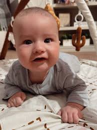 Wishing time would slow down 😭 Happy 4 months to our sweet boy 🤍 still  the happiest, screeching velociraptor around. Brixy found his voice this  month and uses it nonstop!