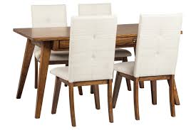 The kidkraft farmhouse table and 4 chairs set in multiple colors is an ideal solution for accommodating your little one's unique height, weight and stature. Centiar Dining Table And 4 Chairs Set Ashley Furniture Homestore