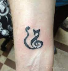 Will tattoo parlours not do tattoos if you have a blood born illness? Black Widow Custom Tattoo Design Cat Treble Clef Tattoo Music Tattoo Designs