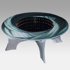 Nest the tables together to form a coffee table that is the perfect size for you, or separate the tables and scatter around the room for a cohesive living room style. Black Hole Illuminated Coffee Table