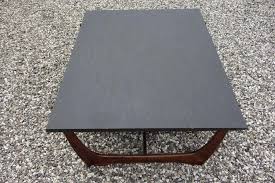 A very unusual eclectic coffee table with a inset honed slate top. Rosewood And Blake Slate Coffee Table Arkitekt Mobler