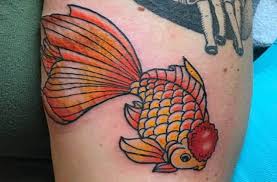 The whole diversity of incredible koi fish tattoo ideas is shown below with pictures and meanings so blue and yellow koi fish which slightly remind of goldfish are placed on the girl's hip. Goldfish Tattoo Meaning Cool Goldfish Tattoos