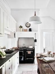 And the white splashback and black cabinetry provide the perfect balance. 180 Country Style Kitchens Ideas In 2021