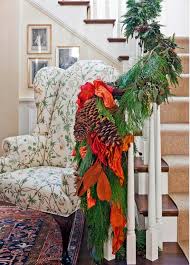 The sparkle that lights give will enhance the silvery snow on the winter. 12 Beautiful Staircases To Sneak Down On Christmas Eve Between Naps On The Porch