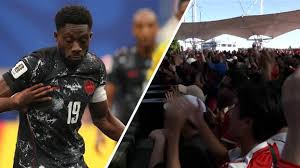 Reaction in Toronto fan zone as Davies comes on for Canada