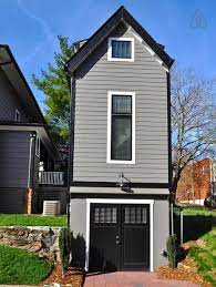 Somehow Three Stories Squeeze Into This Skinny Home Tiny Cottage Small House Tiny House