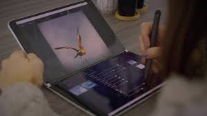 Simply attach duo to your laptop using the magnetic adhesives, plug in the usb, and pull out the second screen to begin working. Surface Neo And Duo Videos Entice Developers Into A Dual Screen World Slashgear