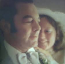 Is the man in the photo the groom or the father?