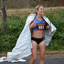 Sahra with legs behind her neg. Sara Hall Solo Half Marathon Pr How She Did The Socially Distanced Race