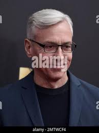 In this May 3, 2017 photo, Dr. Matthew D'Onofrio of Walworth Medical  Associates in Greensburg, Pa., chats with regular patient Charles Wolfe,  81, who came in to see the doctor for his