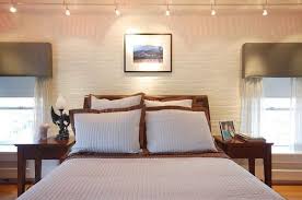 Birchlane.com has been visited by 100k+ users in the past month Painted Brick Love The Track Lighting Above Bed Interior Brick Lights Above Bed Painted Brick