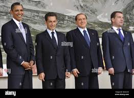 L-R) US President Barack Obama, French President Nicolas Sarkozy, Italian  Prime Minister Silvio Berlusconi and Russian President Dmitry Medvedev pose  for a family photo at the Guardia Di Finanza School of Coppito