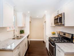 15 Of The Best Flip Or Flop Kitchens Hgtv S Flip Or Flop Hgtv White Heat This Monochromatic White Contemporary Kitchen Flip Or Flop Contemporary Kitchen