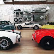 The master bedroom suite enjoys an empty nester design. 12 Captivating Motorcycle Wheels Ideas Vintage Car Garage Dream Car Garage Dream Garage