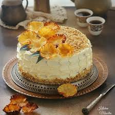 Hummingbird Cake A Rich Flavored Cake With Pineapple And Banana Filling Decorated With Dried Pineapple Flower Hummingbird Cake Cake Decorating Tips Desserts