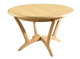 It has a hidden extension which lets you expand it. Round Table Expanding Dining Plans Graphics Extendable Homifind