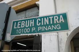 The men carried lit red lanterns when they left the train so in case of an emergency the crew caller would be able to find them. Lebuh Cintra Cintra Street George Town