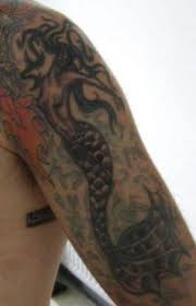 See more ideas about mermaid tattoos, tattoos, mermaid tattoo. Elegant Black Mermaid Tattoo On Arm Tattooimages Biz