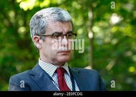 French diplomate Jacques Audibert are pictured as French President Francois  Hollande speaks to the press at